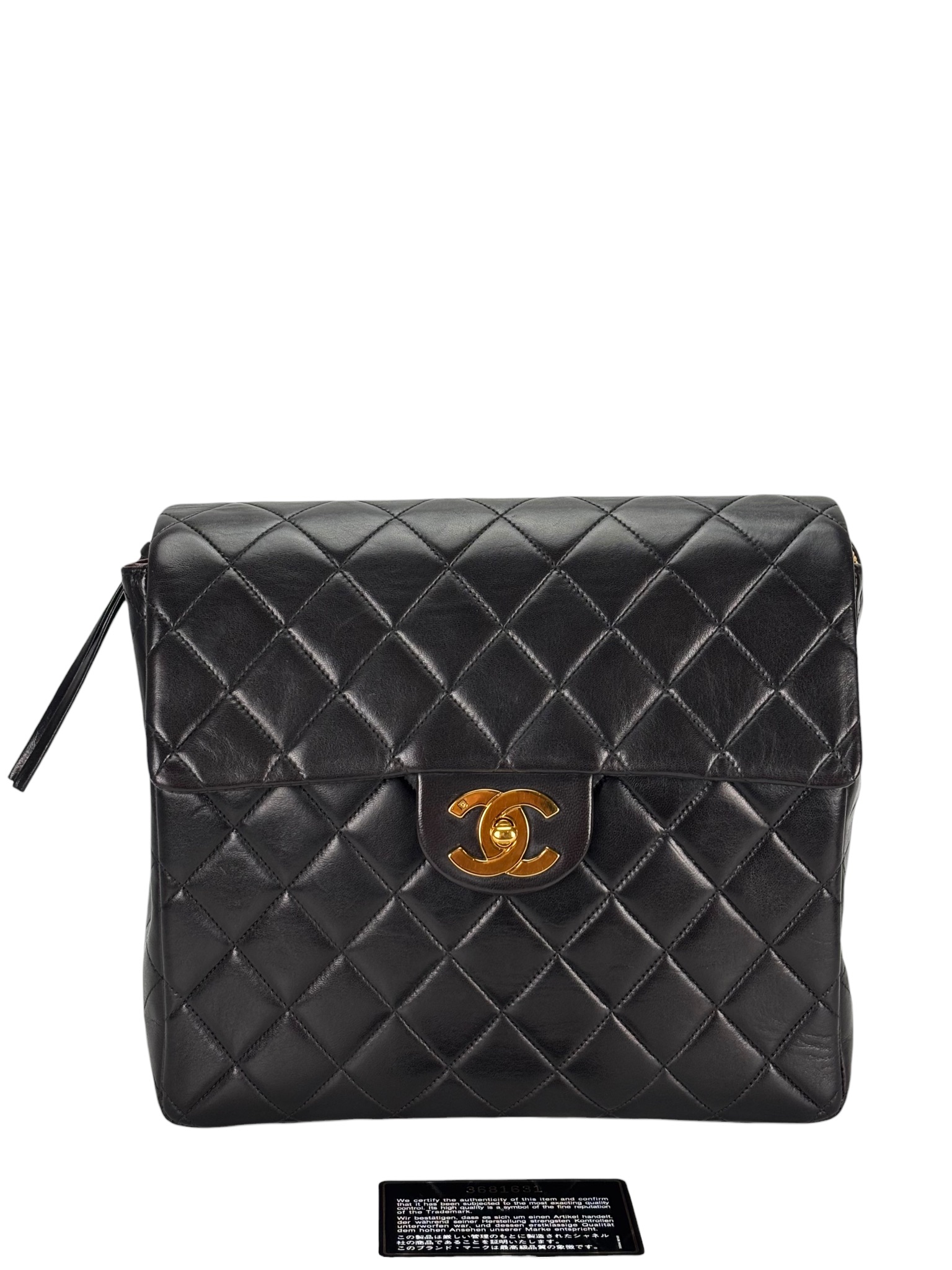 CHANEL - Black Lambskin Deca Coco Mark Matelasse Backpack