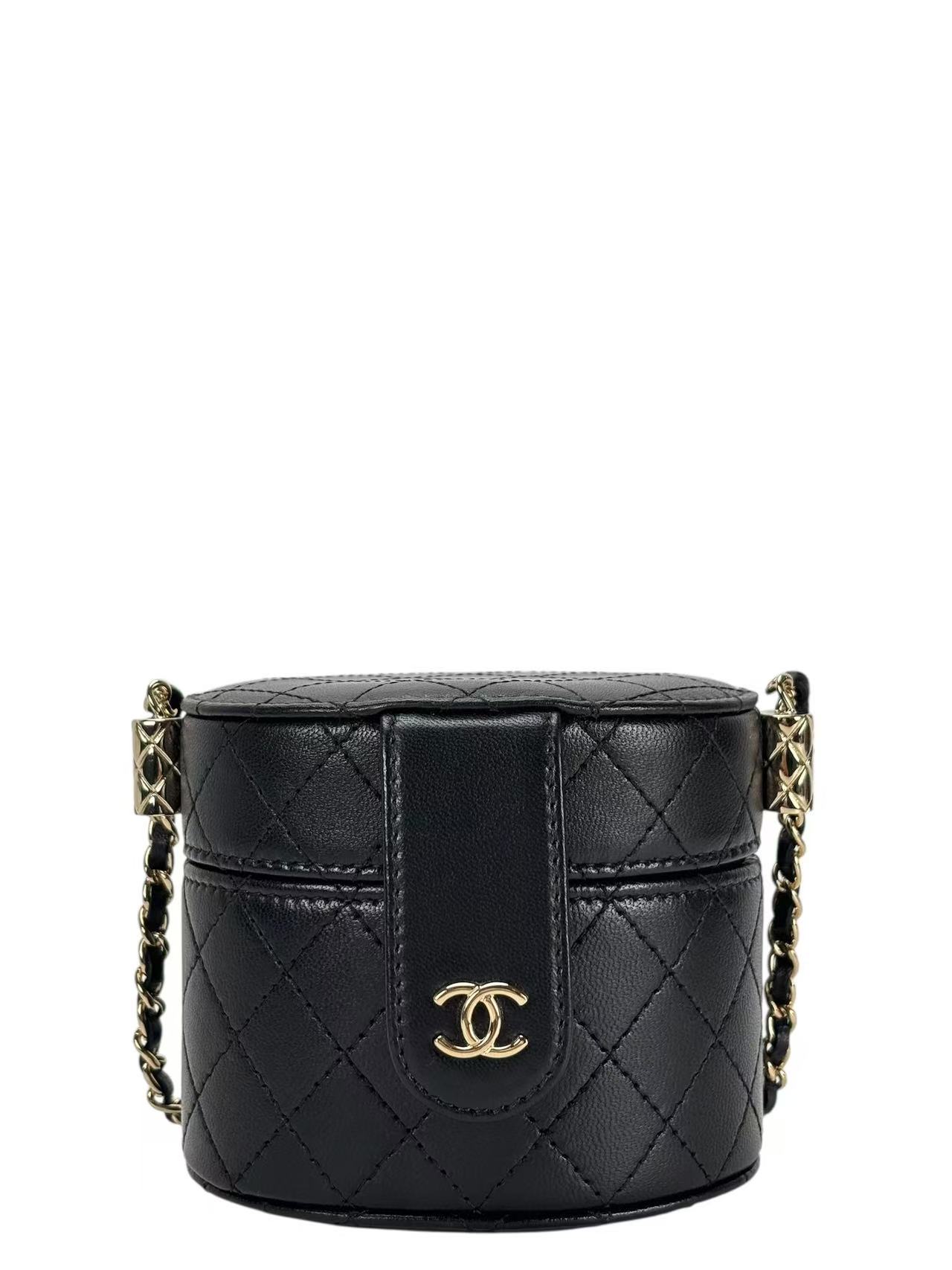 CHANEL - Black Lambskin Quilted Mini Round Vanity Case Chain Bag
