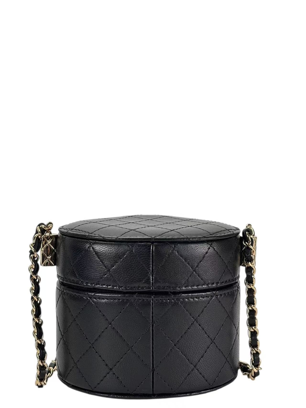 CHANEL - Black Lambskin Quilted Mini Round Vanity Case Chain Bag
