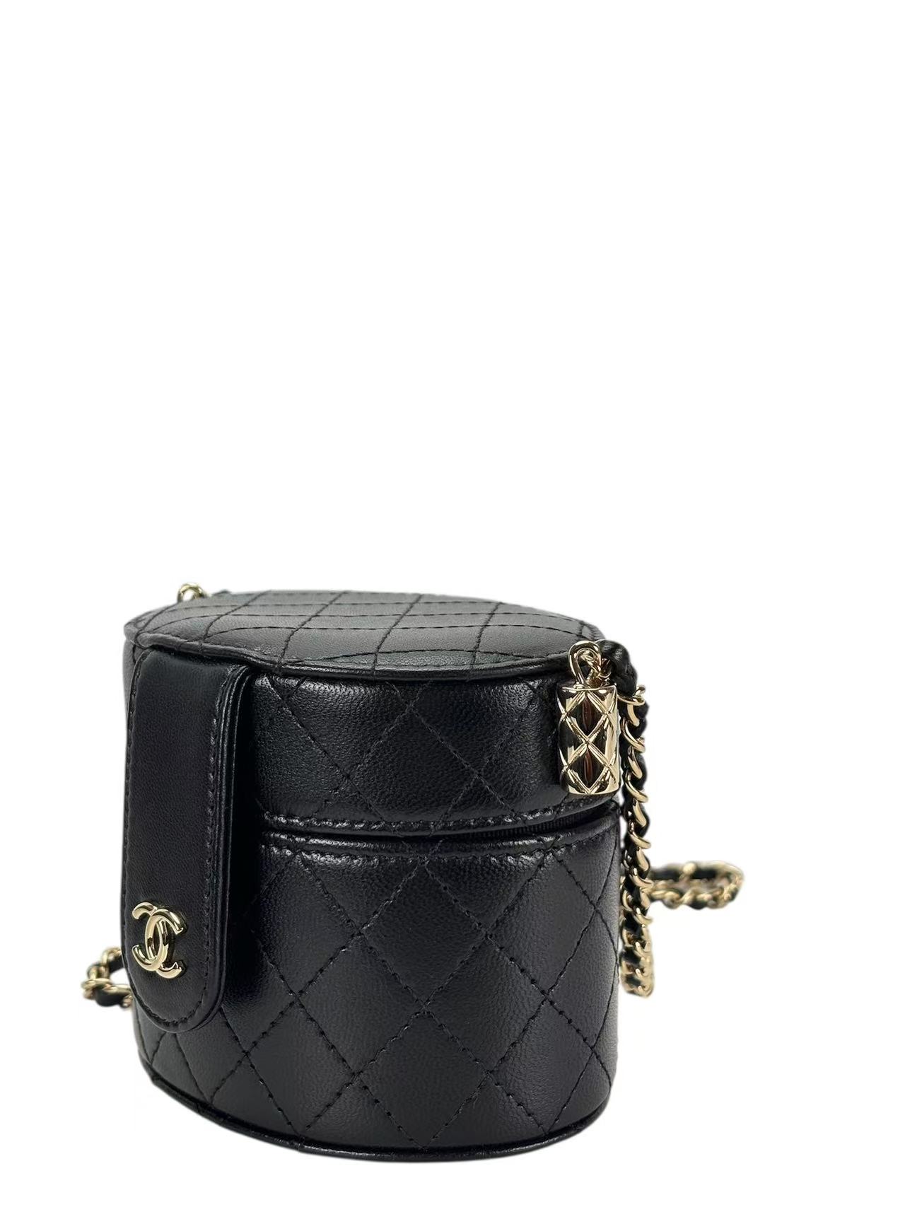 CHANEL - Black Lambskin Quilted Mini Round Vanity Case Chain Bag