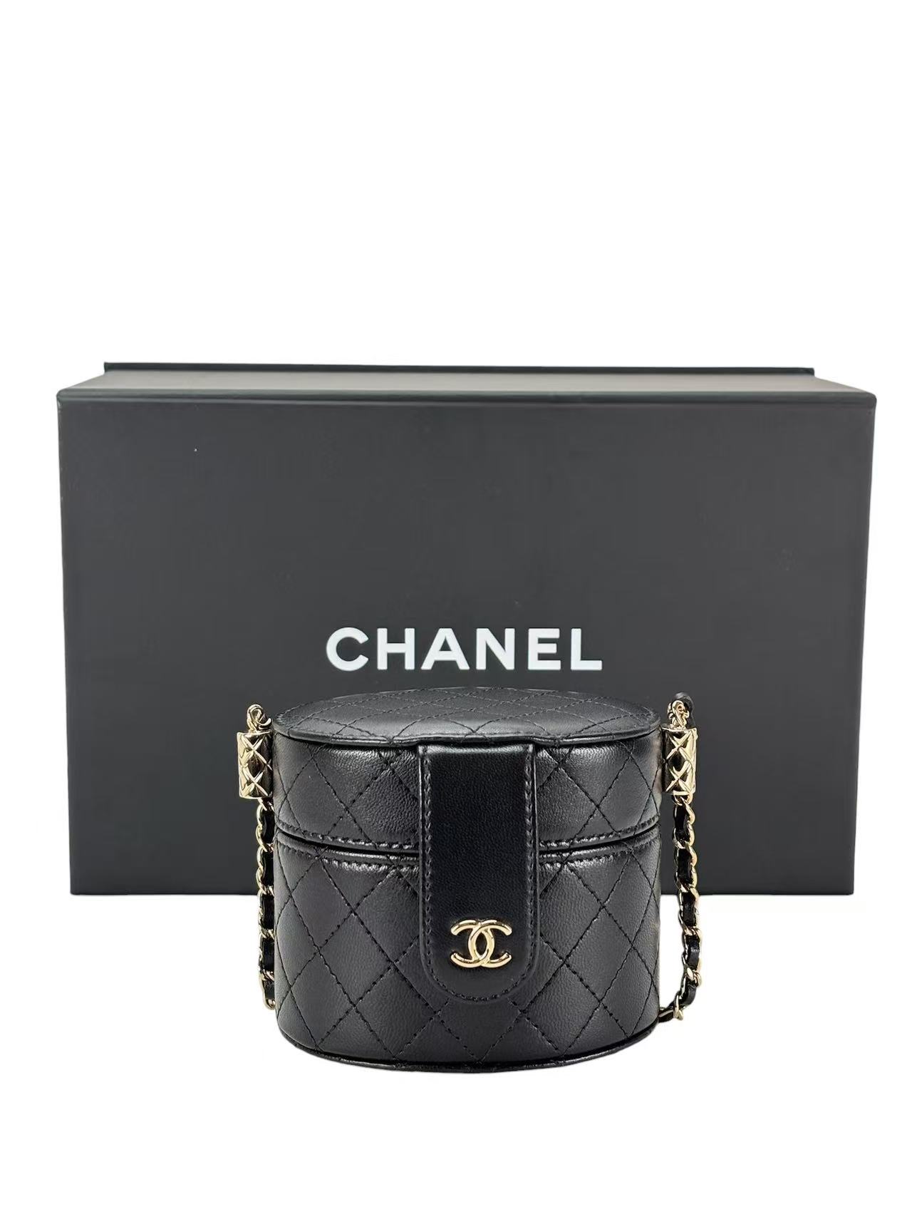CHANEL - Black Lambskin Quilted Mini Round Vanity Case Chain Bag