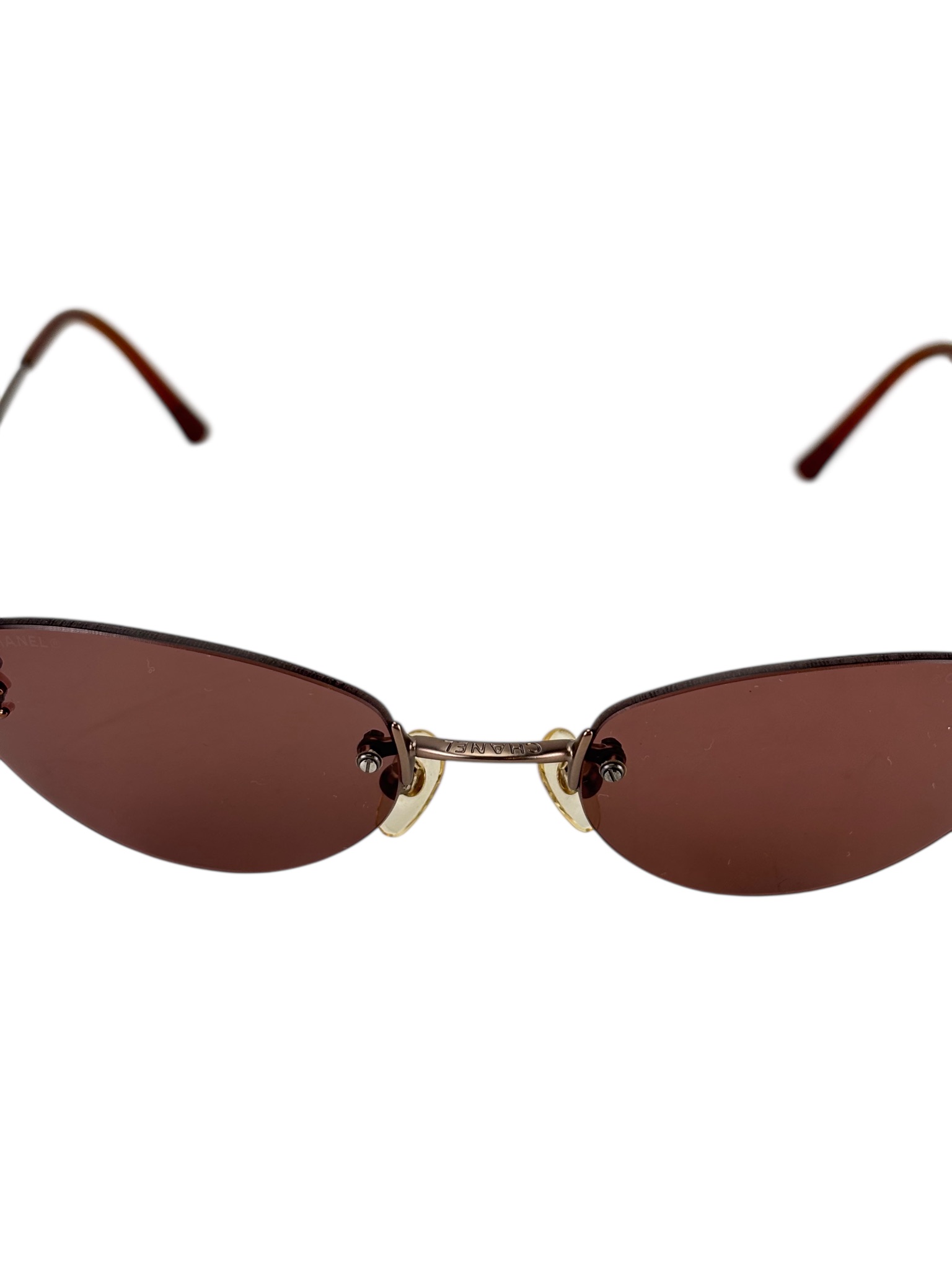 CHANEL - Rimless Double C Iridescent Oval Sunglasses in BROWN