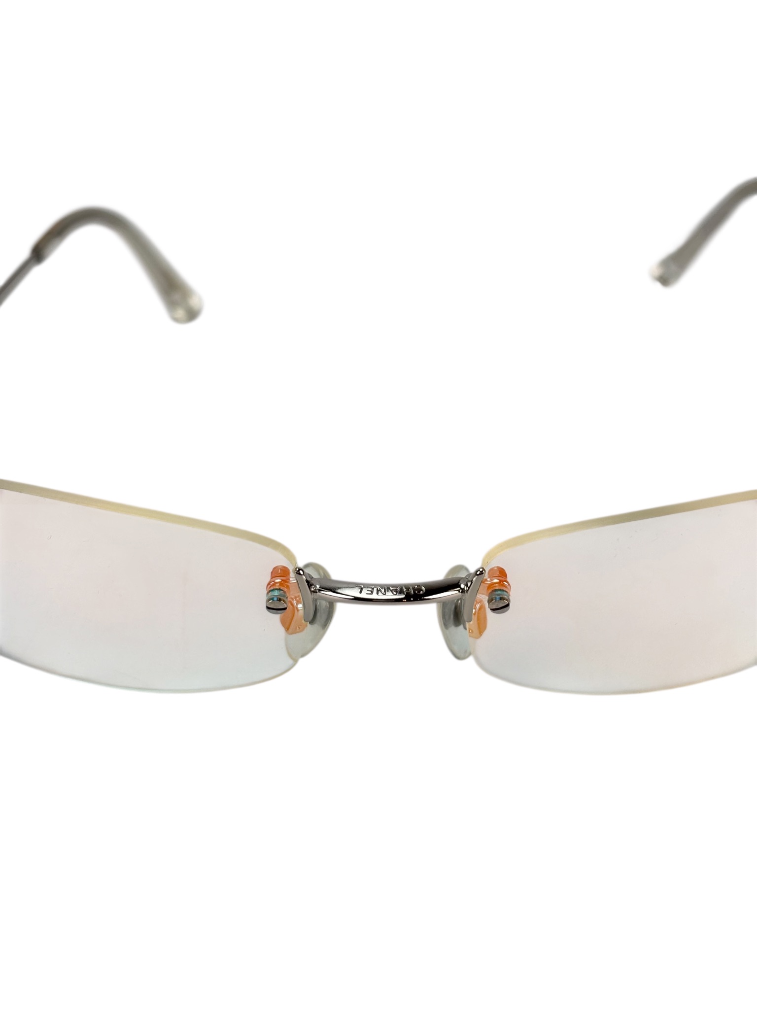 CHANEL - Rimless Iridescent Oval Sunglasses in Blue