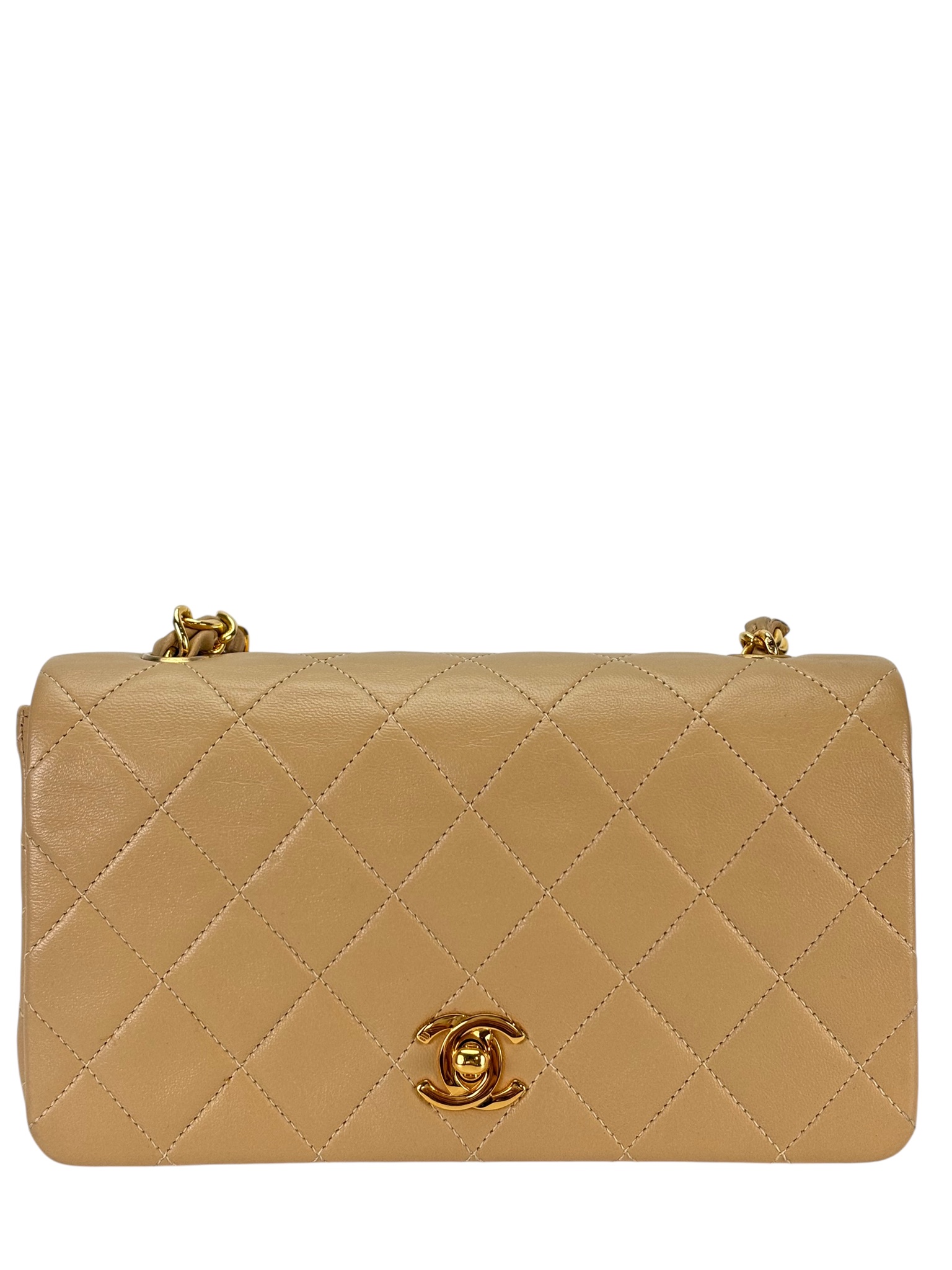 CHANEL - Beige Lambskin Mini Single Flap Gold Hardware. 