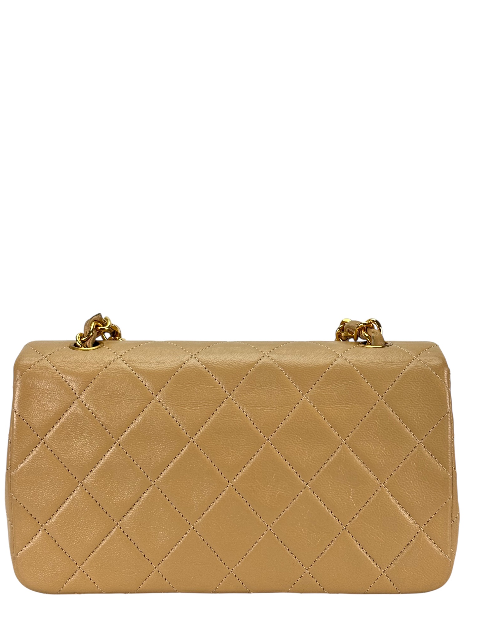 CHANEL - Beige Lambskin Mini Single Flap Gold Hardware. 