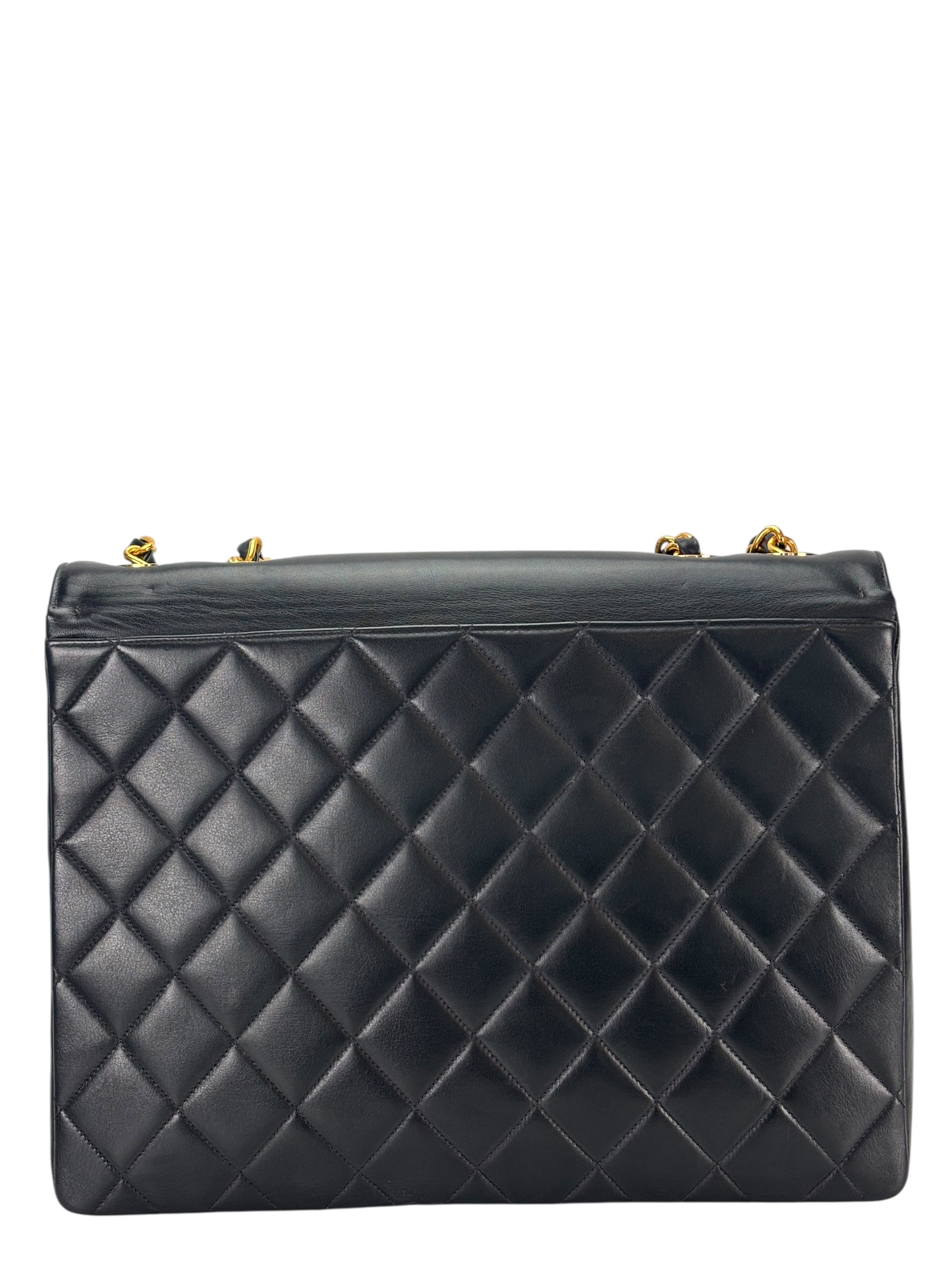 CHANEL - Black Lambskin Maxi Classic Flap Shoulder Bag