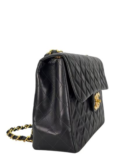 CHANEL - Black Lambskin Maxi Classic Flap Bag