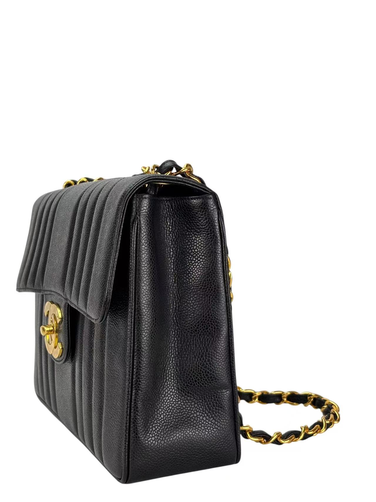CHANEL - Black Caviar Jumbo Matelasse Flap Bag 30 Gold Hardware