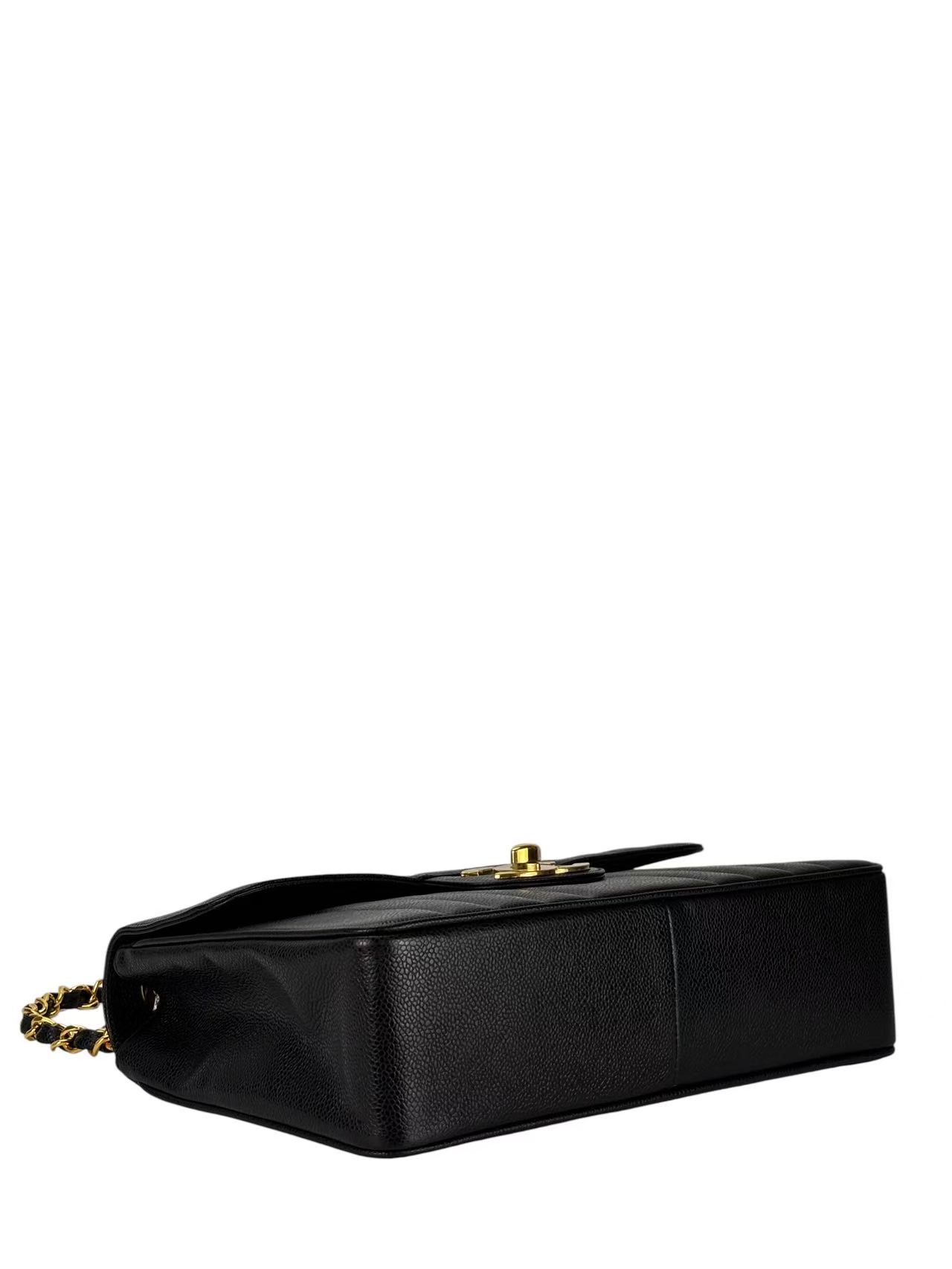 CHANEL - Black Caviar Jumbo Matelasse Flap Bag 30 Gold Hardware