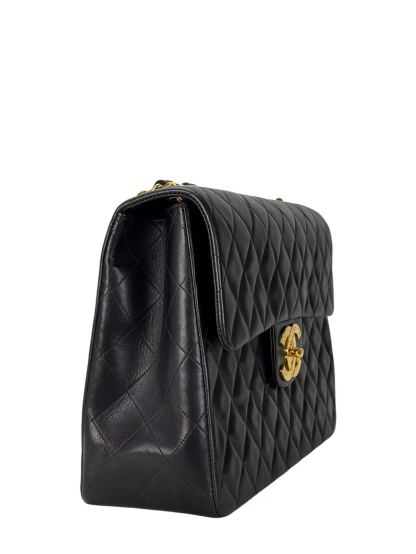 CHANEL - Black Lambskin Maxi Classic Flap Bag