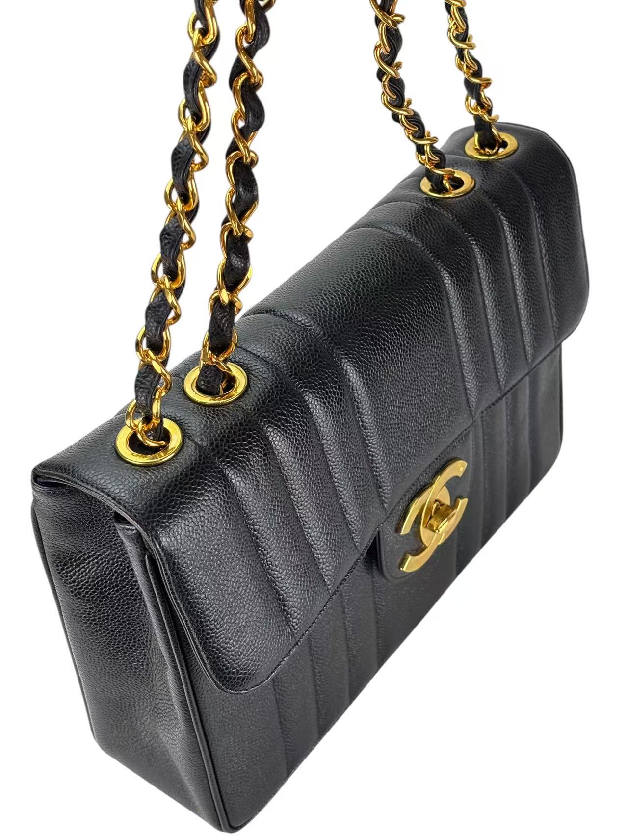 CHANEL - Black Caviar Jumbo Matelasse Flap Bag 30 Gold Hardware