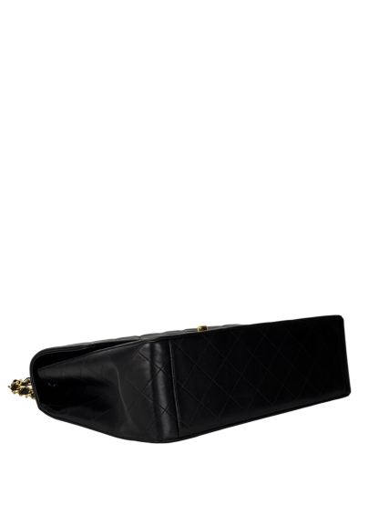 CHANEL - Black Lambskin Maxi Classic Flap Bag