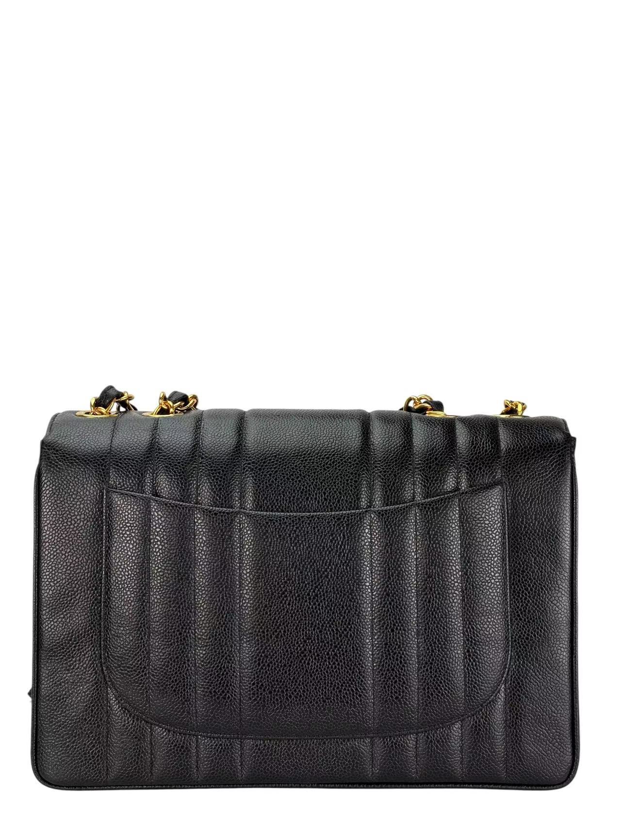 CHANEL - Black Caviar Jumbo Matelasse Flap Bag 30 Gold Hardware