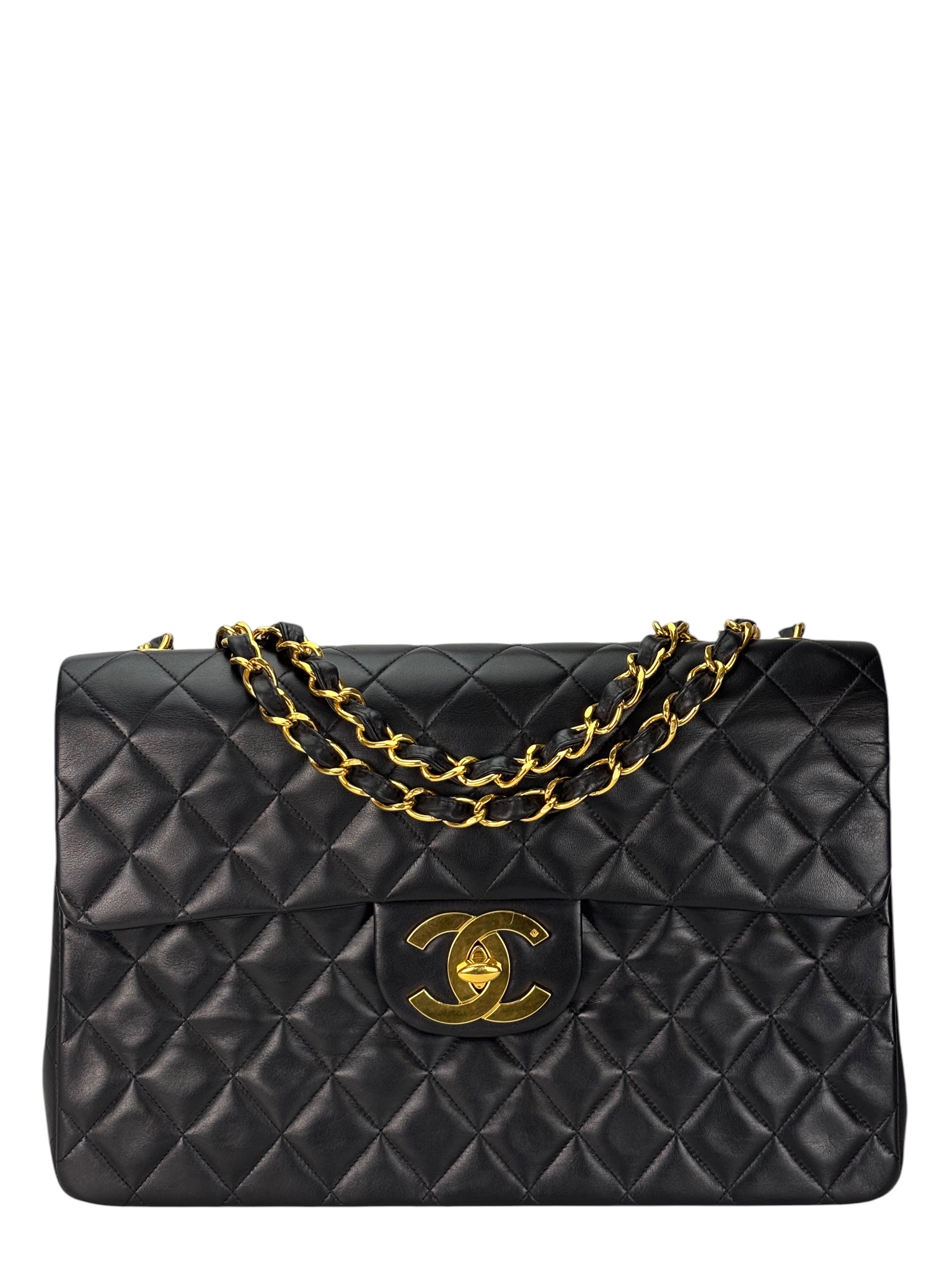 CHANEL - Black Lambskin Maxi Classic Flap Bag