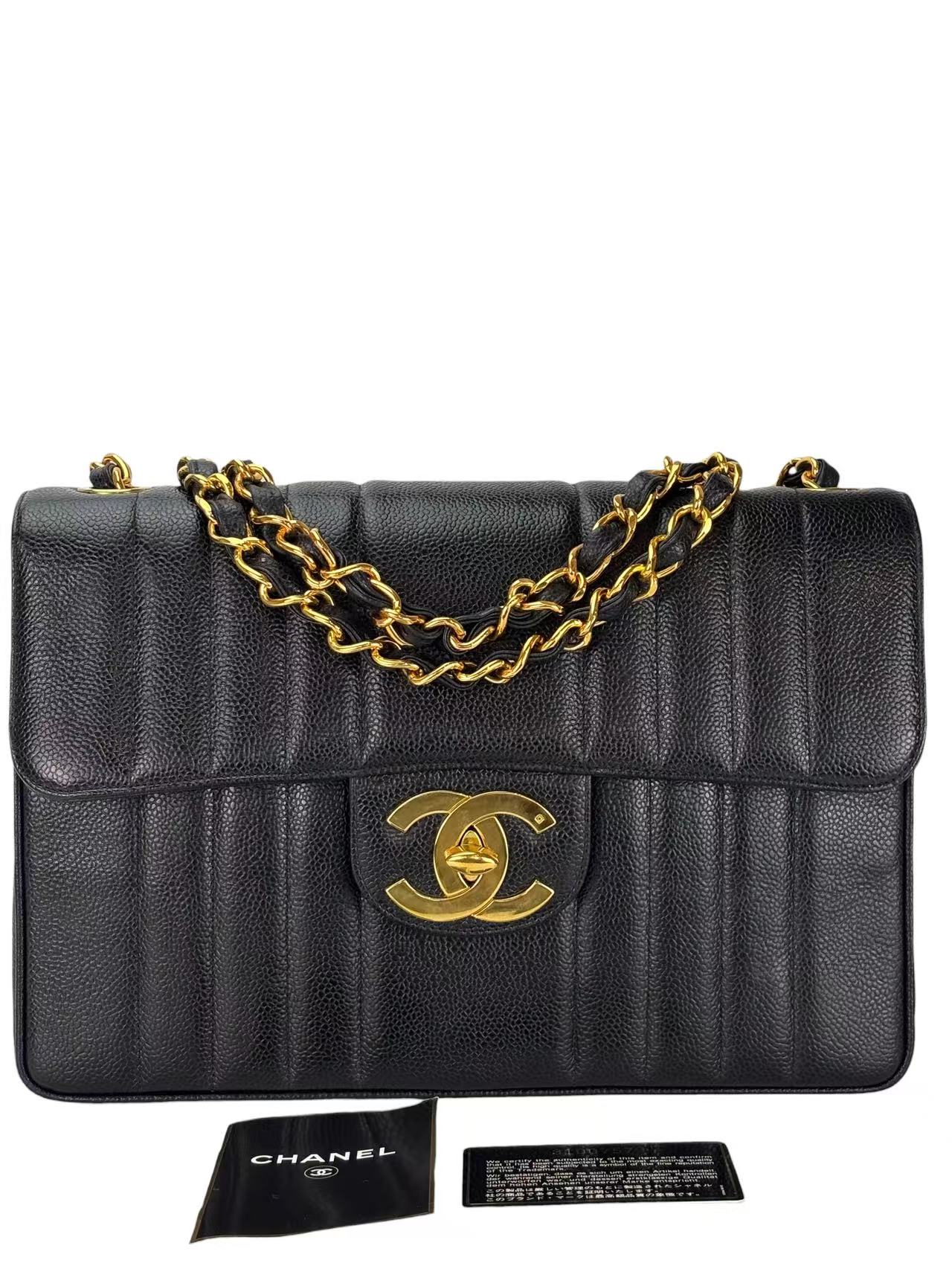 CHANEL - Black Caviar Jumbo Matelasse Flap Bag 30 Gold Hardware
