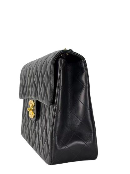 CHANEL - Black Lambskin Maxi Classic Flap Bag