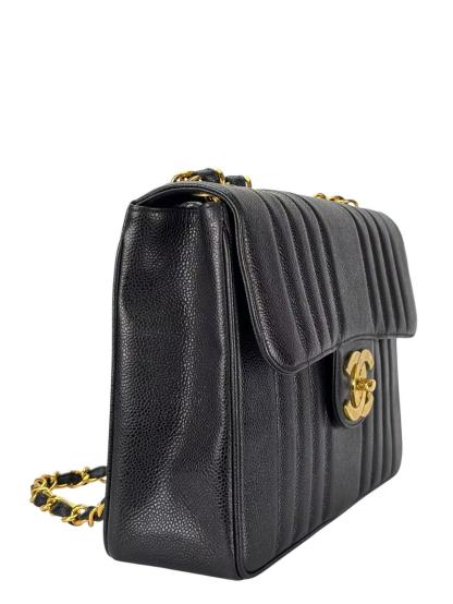 CHANEL - Black Caviar Jumbo Matelasse Flap Bag 30 Gold Hardware