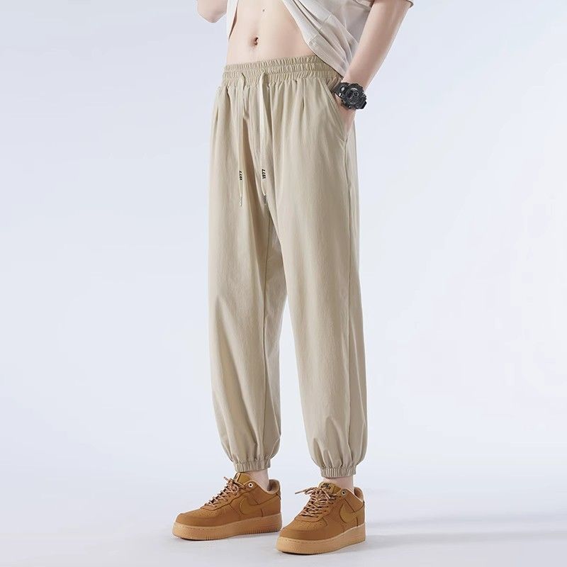 夏季冰絲褲子男寬鬆薄款休閒褲束腳哈倫大碼運動長褲九分