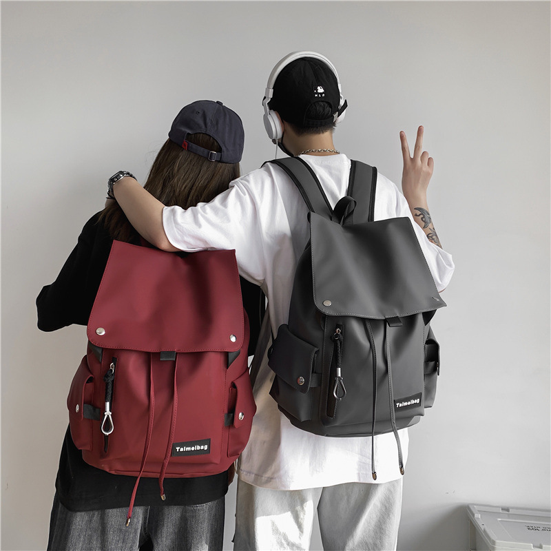 潮酷情侶款機車大容量多功能街頭雙肩背包