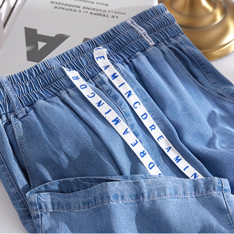 大尺寸天絲牛仔褲 夏季薄款鬆緊高腰顯瘦垂感直筒褲 150公斤可穿