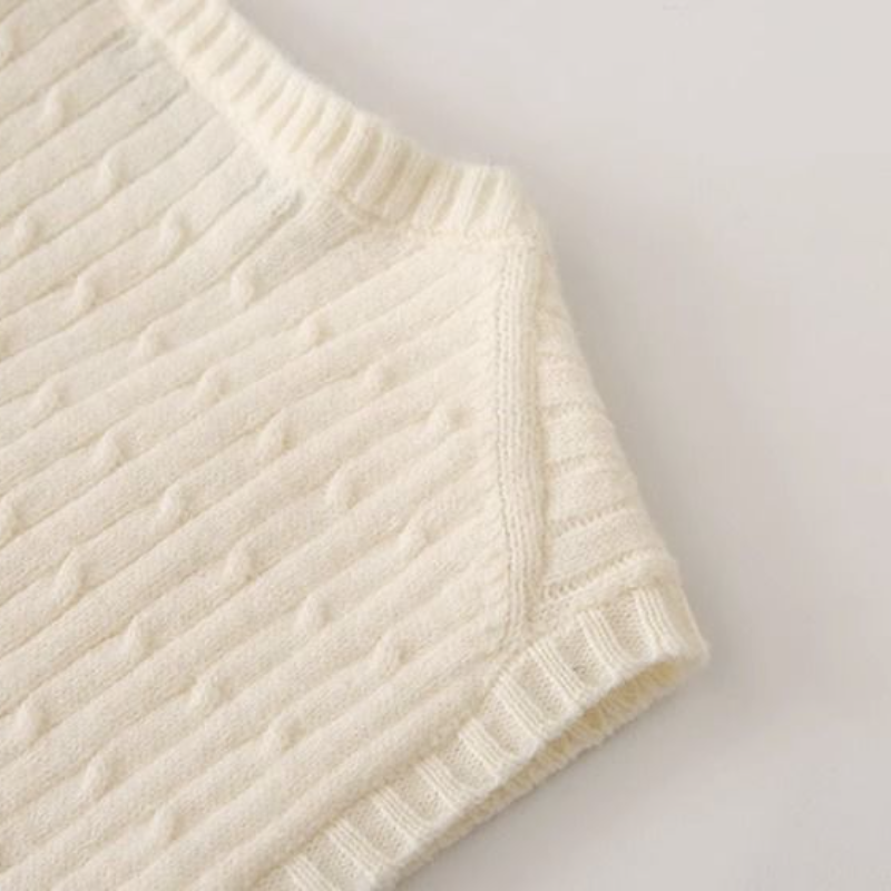 美式復古麻花針織背心 V 領設計 寬鬆慵懶感無袖上衣