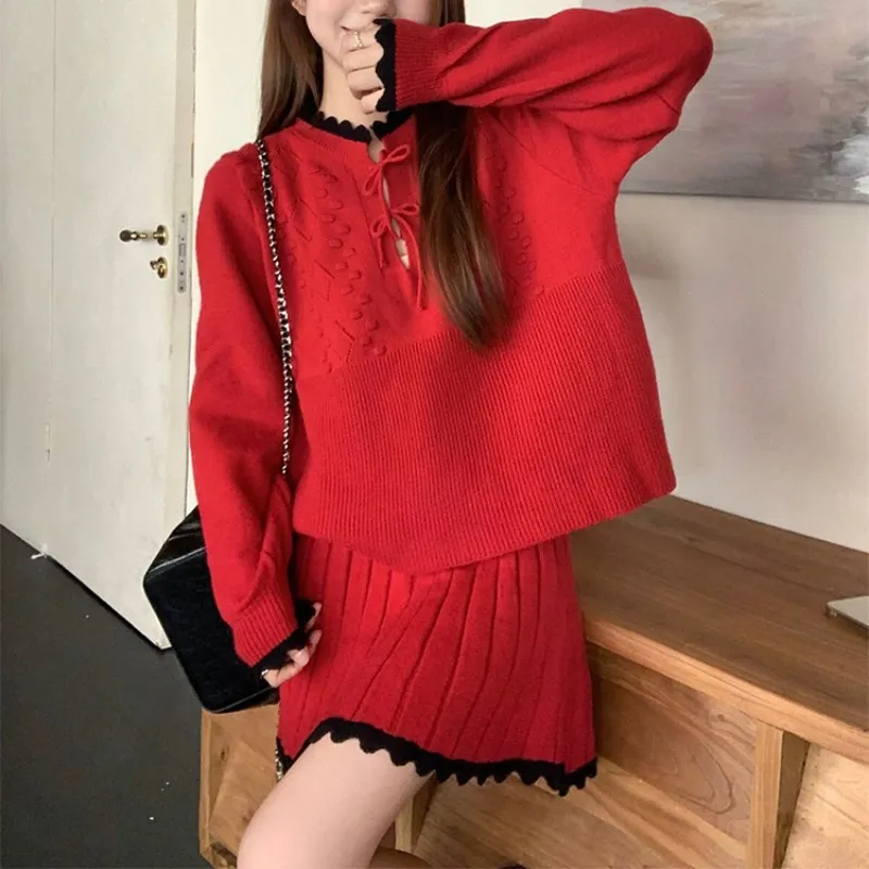 溫柔系針織套裝 蝴蝶結織紋上衣＋百褶裙 兩件式 顯瘦減齡