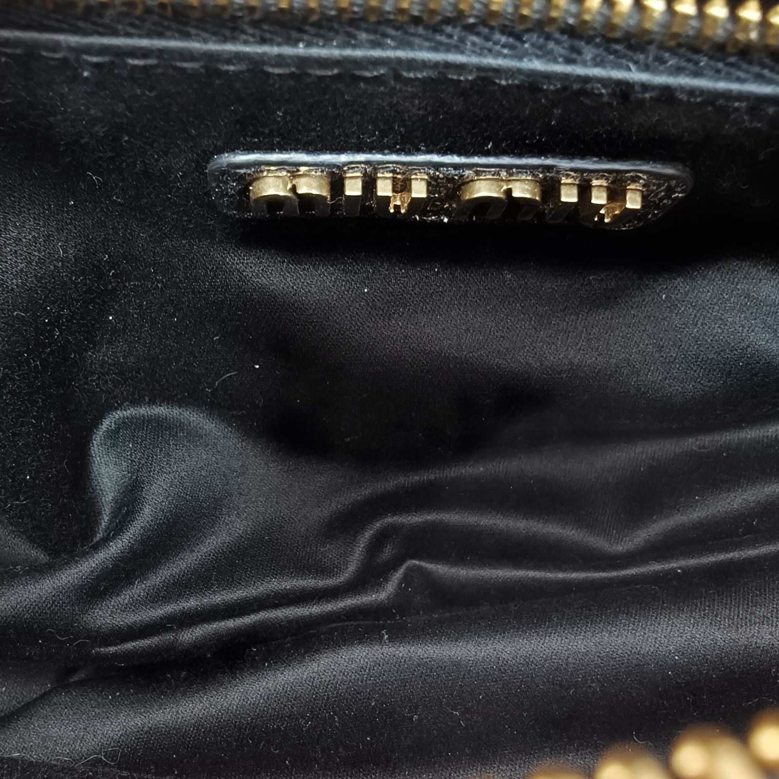 *MIUMIU Hobo Motorcycle Bag Embossed Engraved Logo-Hana Vintage