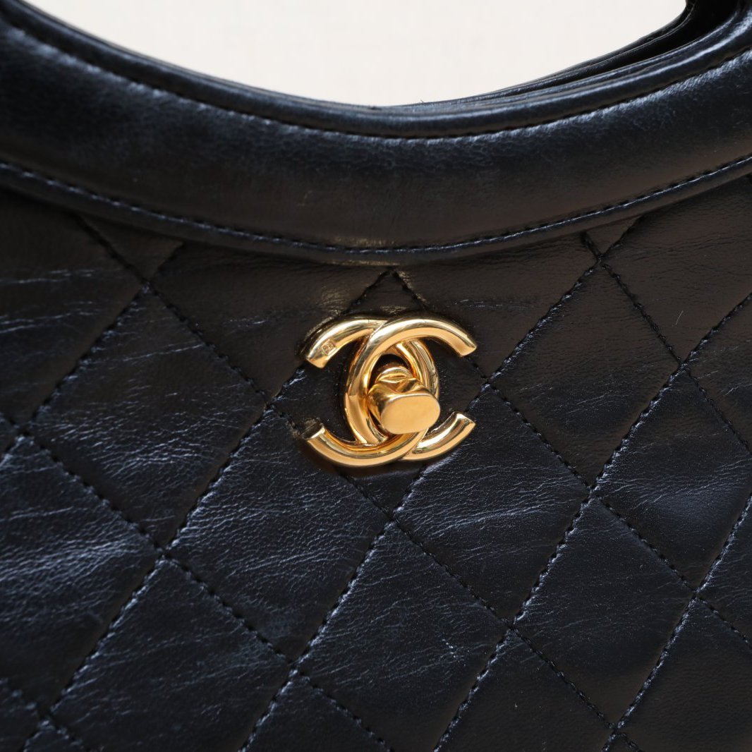 CHANEL Vintage Mini 31 Black and Gold Lambskin Bag