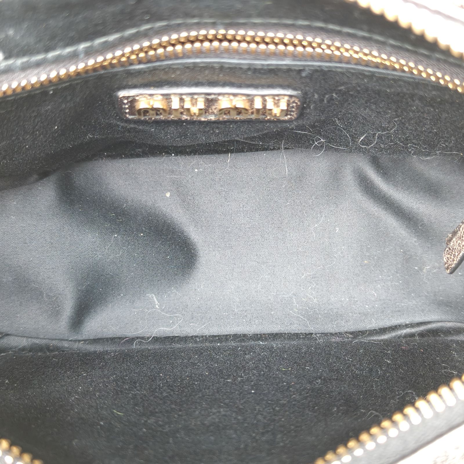 *MIUMIU Hobo Motorcycle Bag Embossed Engraved Logo-Hana Vintage