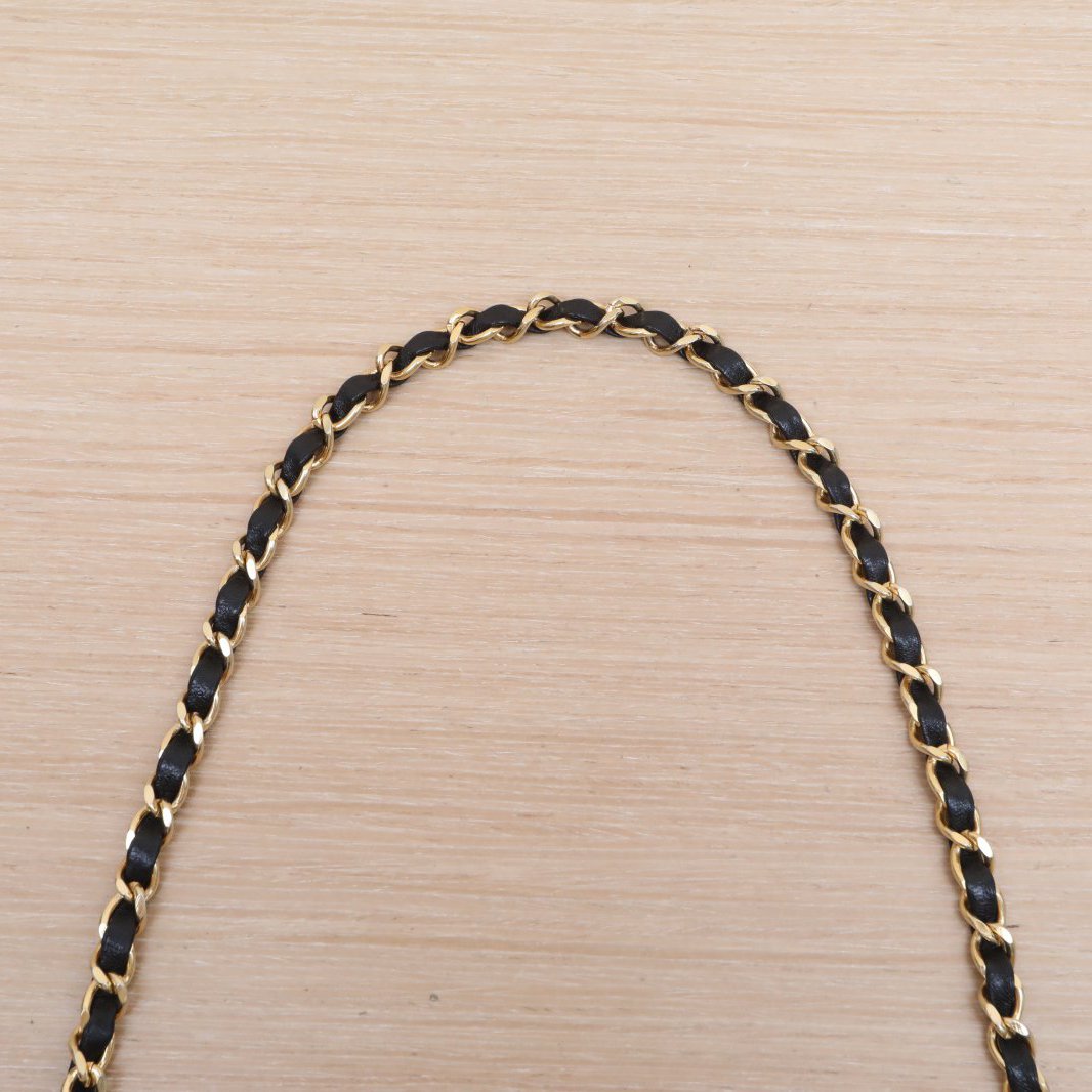 CHANEL Vintage Mini 31 Black and Gold Lambskin Bag