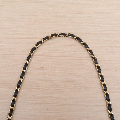 CHANEL Vintage Mini 31 Black and Gold Lambskin Bag