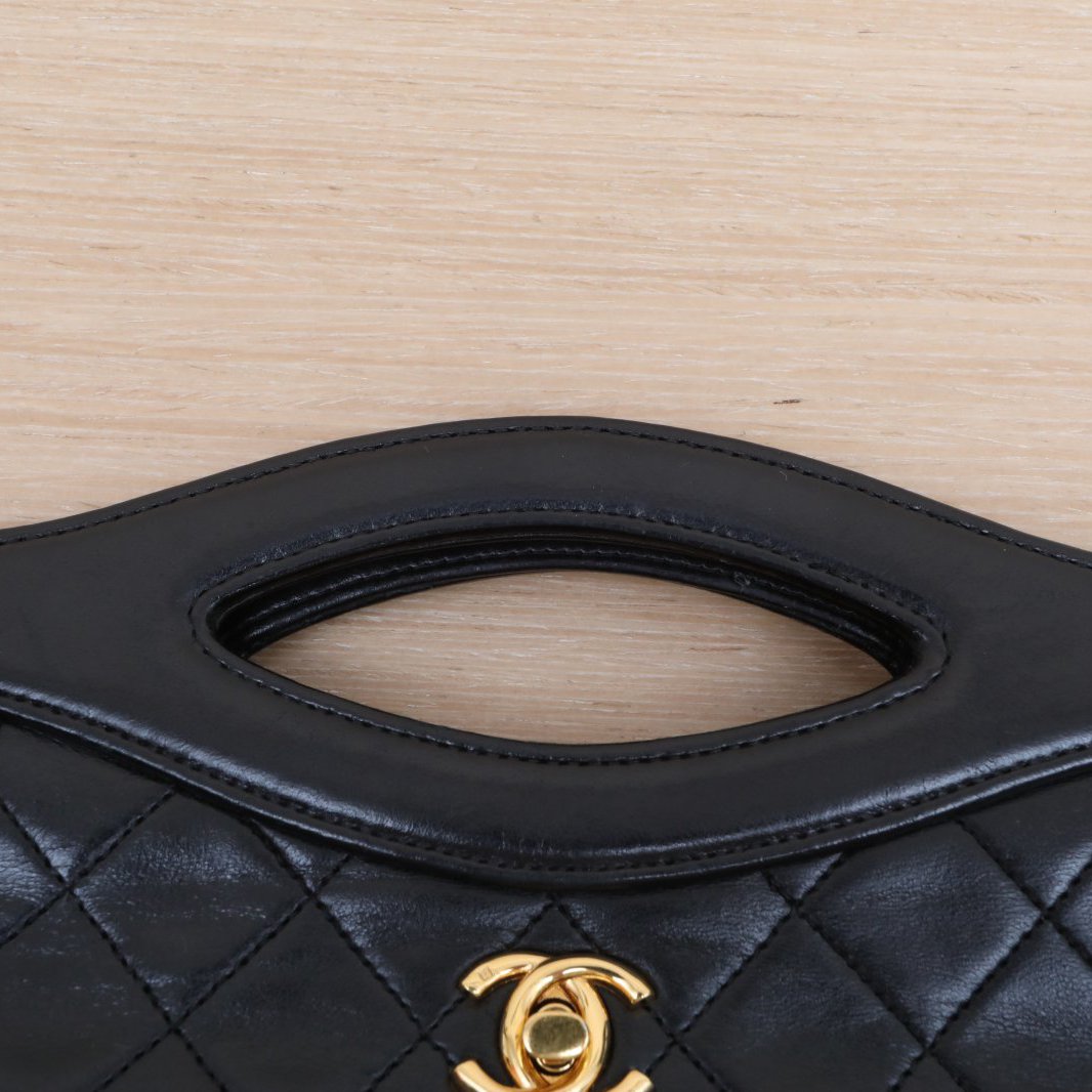CHANEL Vintage Mini 31 Black and Gold Lambskin Bag
