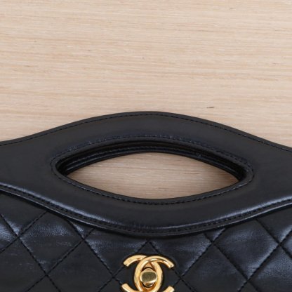 CHANEL Vintage Mini 31 Black and Gold Lambskin Bag