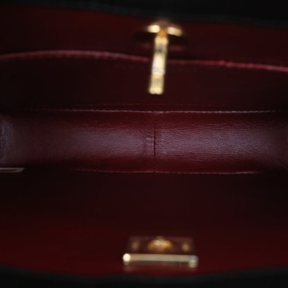 CHANEL Vintage Mini 31 Black and Gold Lambskin Bag