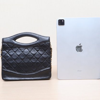 CHANEL Vintage Mini 31 Black and Gold Lambskin Bag