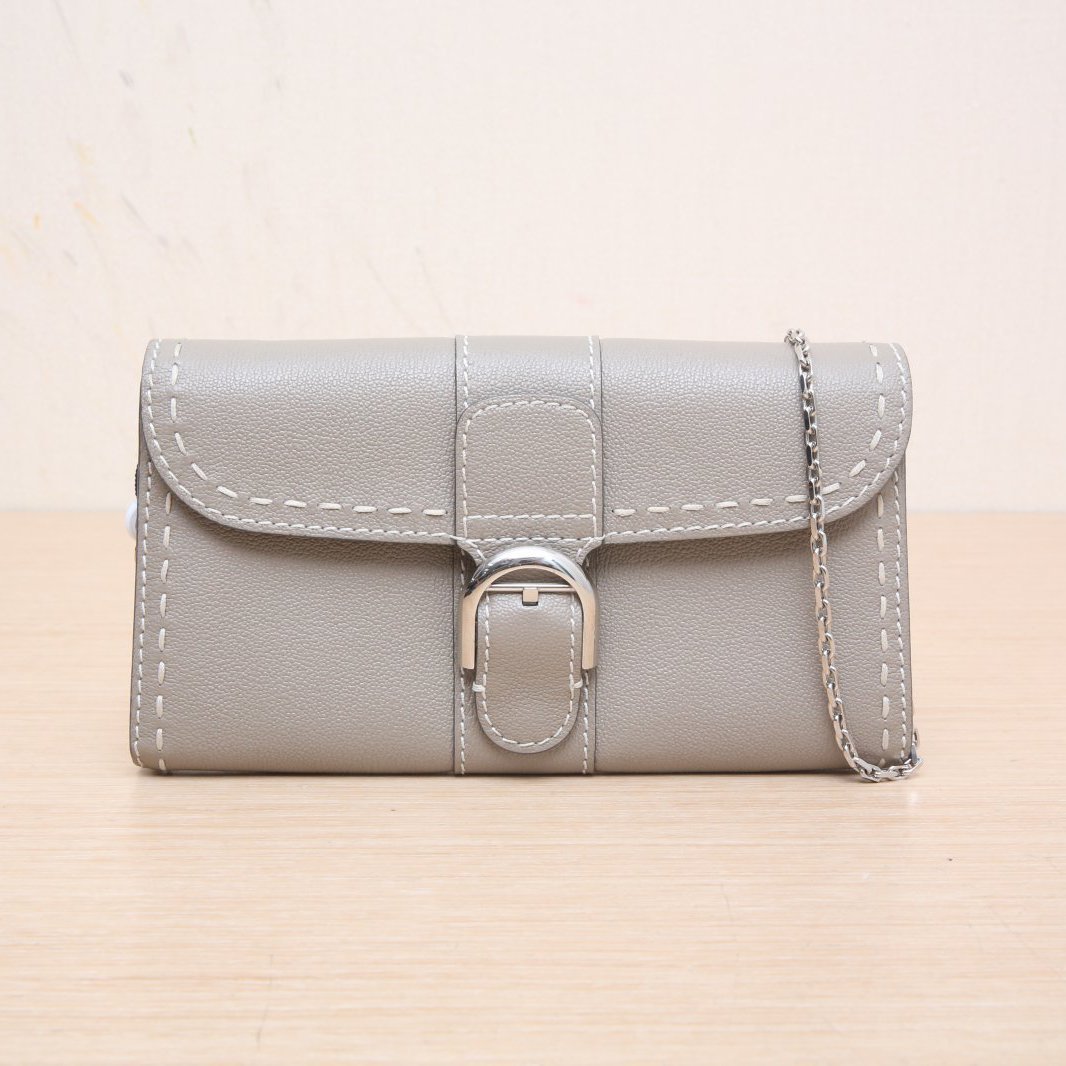 DELVAUX Brillant Woc 21