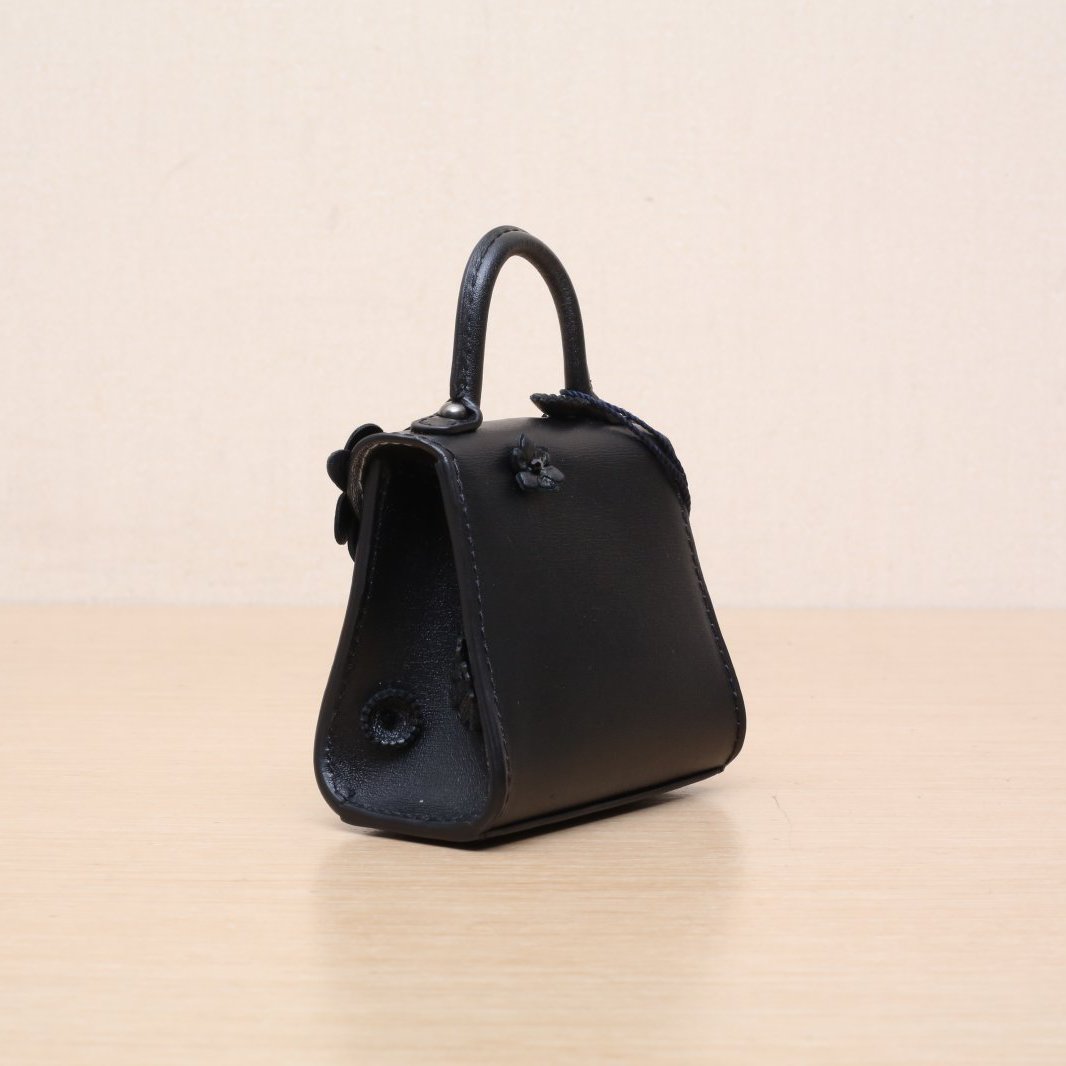 DELVAUX Black Brillant Ultra Mini Embossed Flower Diamond Bag