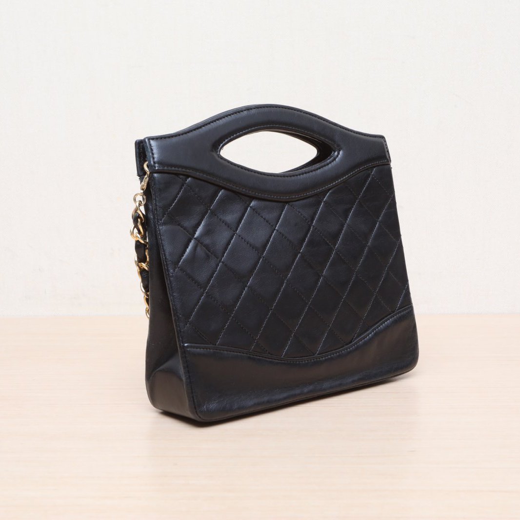 CHANEL Vintage Mini 31 Black and Gold Lambskin Bag
