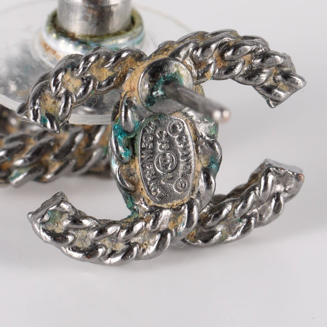 CHANEL Double C Earrings 18V Alloy