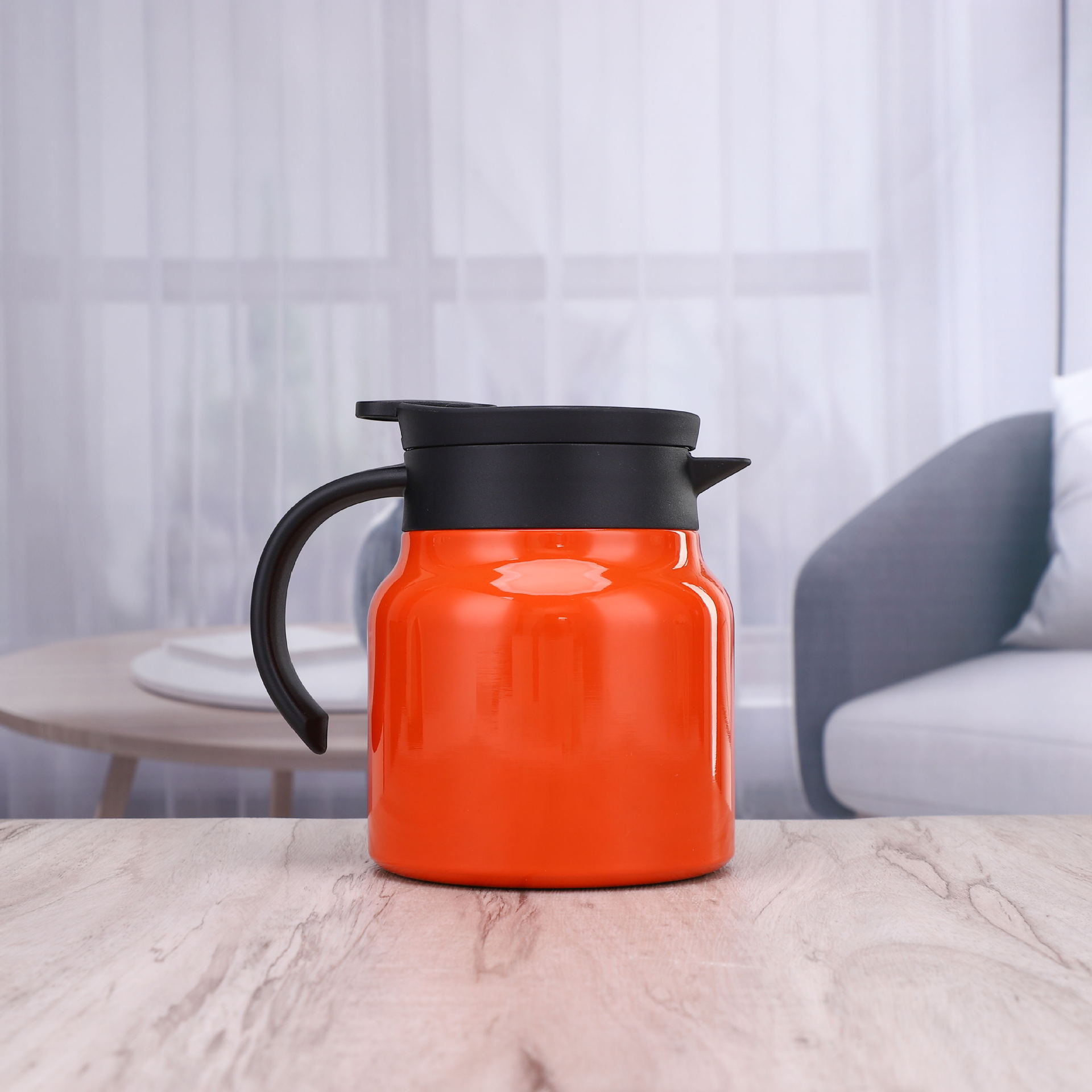 Thermal insulated stainless steel pot steeps tea aroma.
