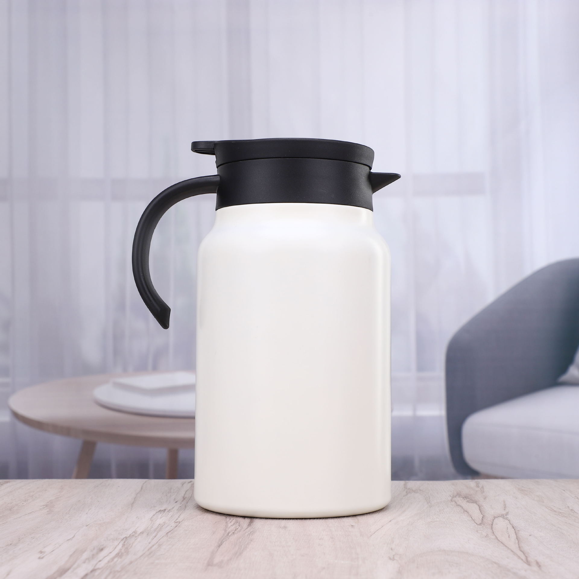 Thermal insulated stainless steel pot steeps tea aroma.