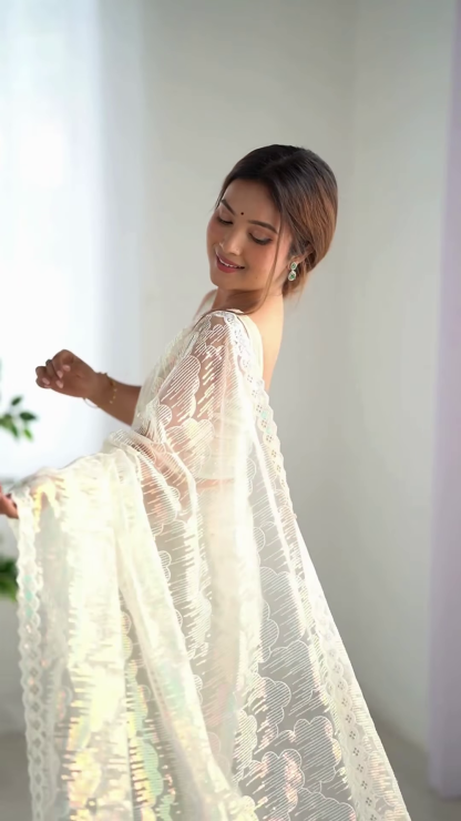 Ivory Elegance – A Saree of Pure Grace