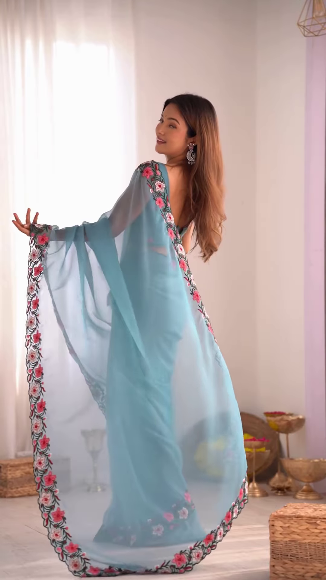 Teal Serenity – A Floral Dream in a Saree