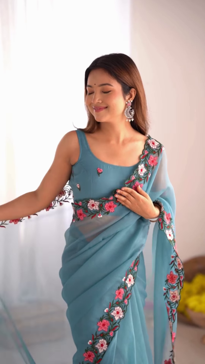 Teal Serenity – A Floral Dream in a Saree