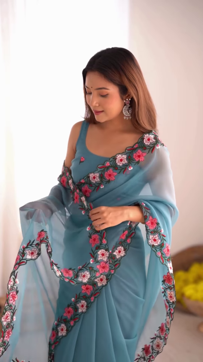 Teal Serenity – A Floral Dream in a Saree