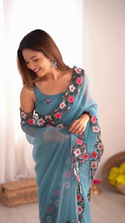 Teal Serenity – A Floral Dream in a Saree
