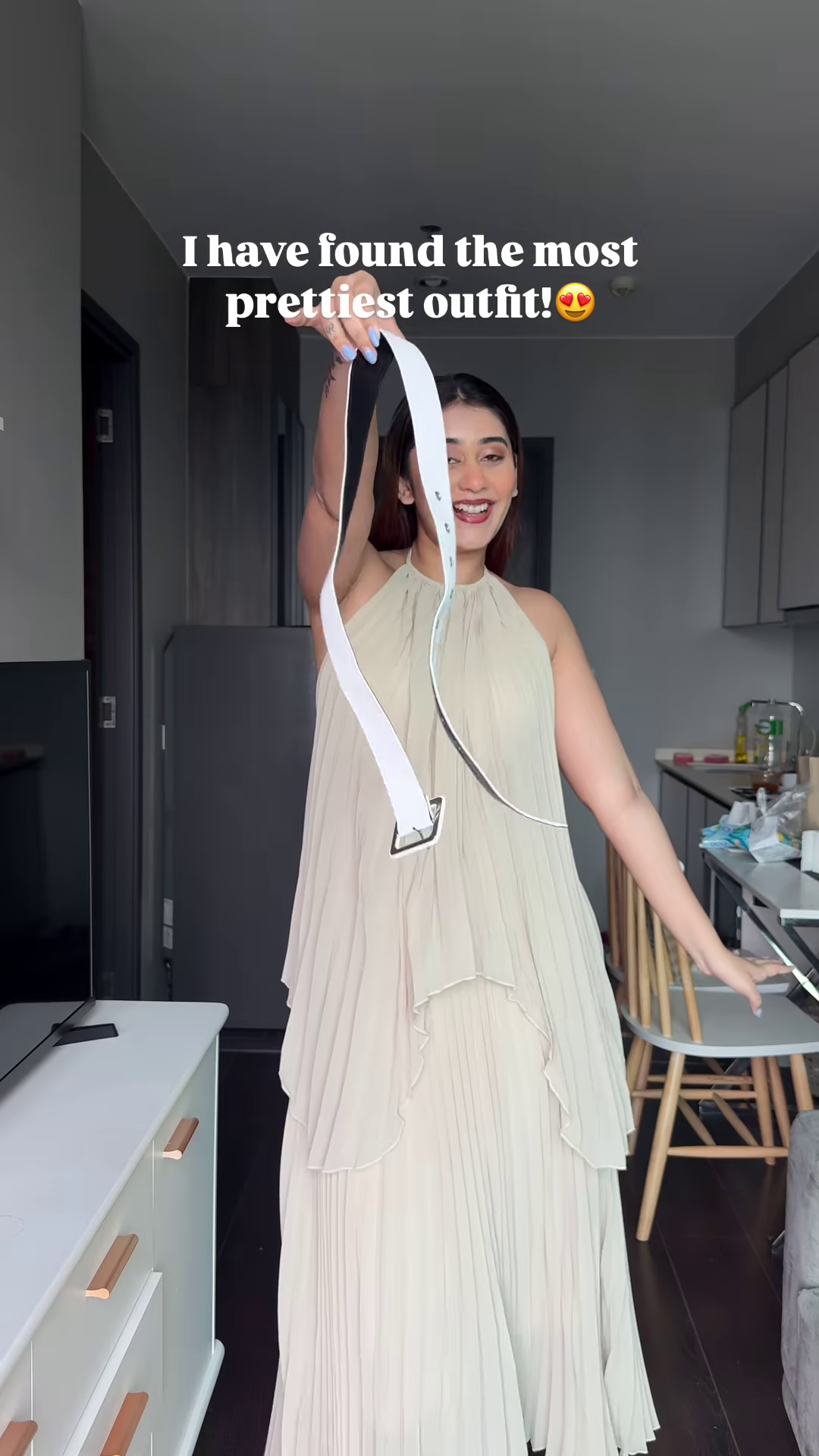 Elegant Flowing Beige Dress with Halter Neck – A Dreamy Day Look