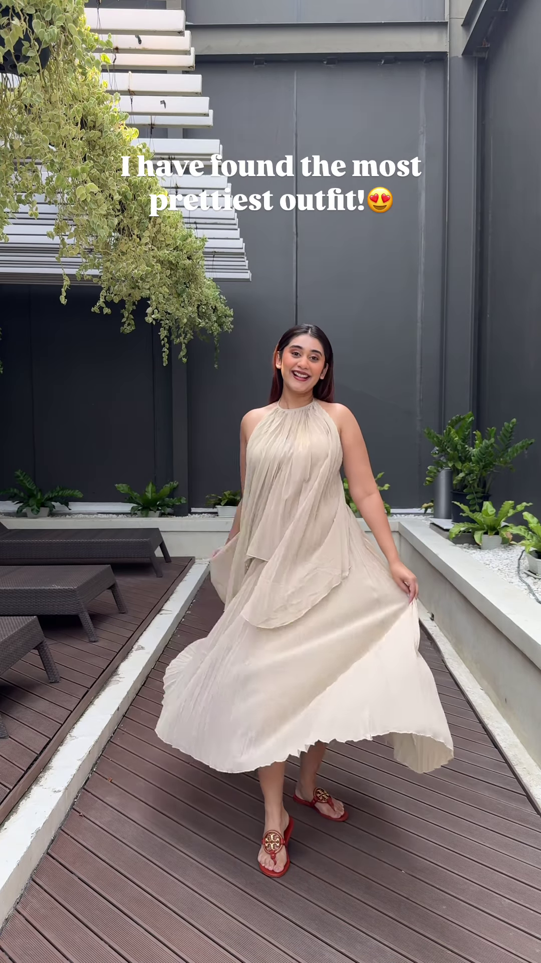 Elegant Flowing Beige Dress with Halter Neck – A Dreamy Day Look