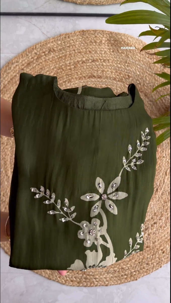 Blossom into Spring with Our Green Embroidered Top