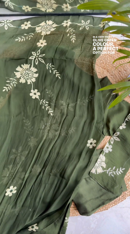 Blossom into Spring with Our Green Embroidered Top